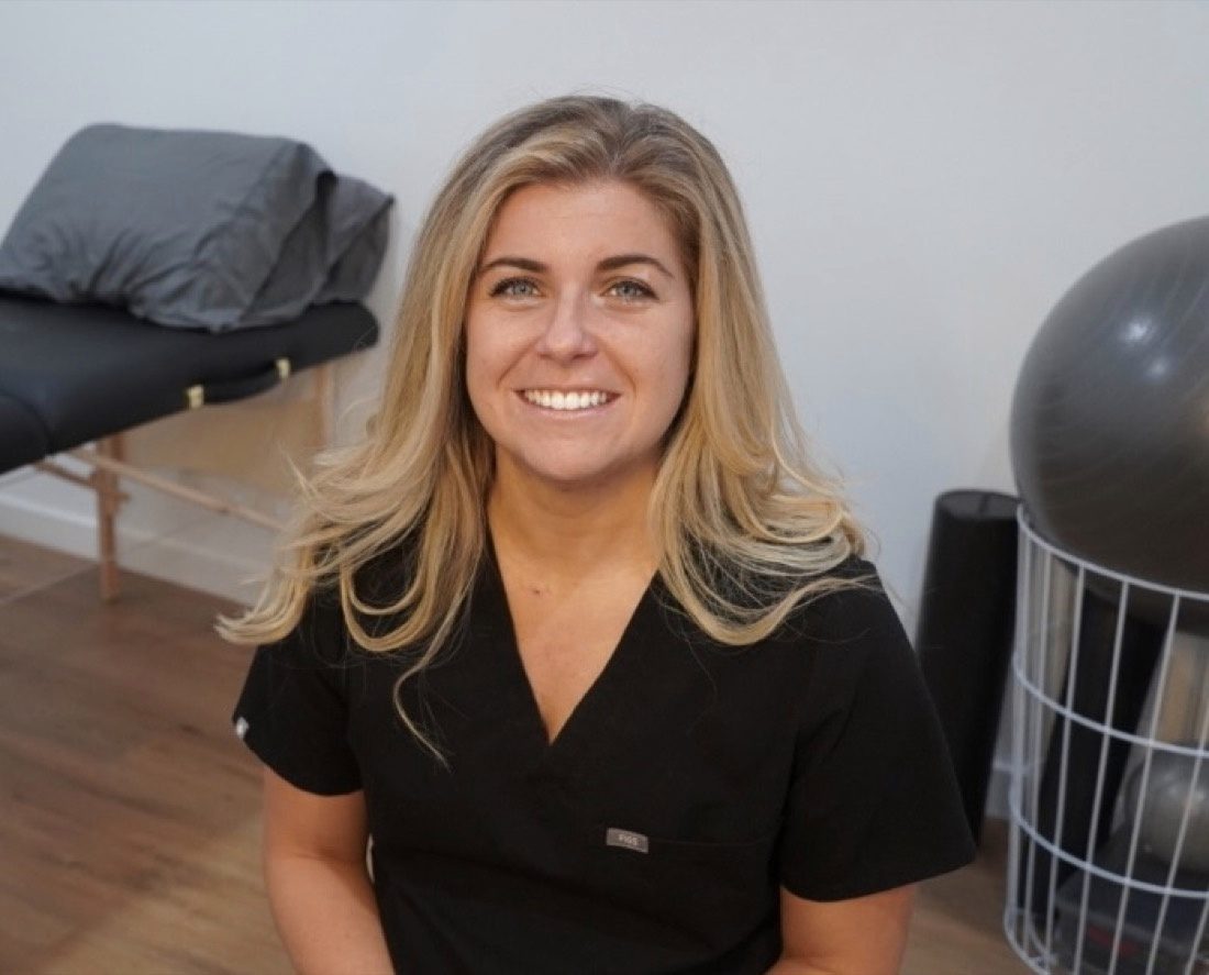 Dr. Corrine Macchi seated in her Santa Monica treatment room