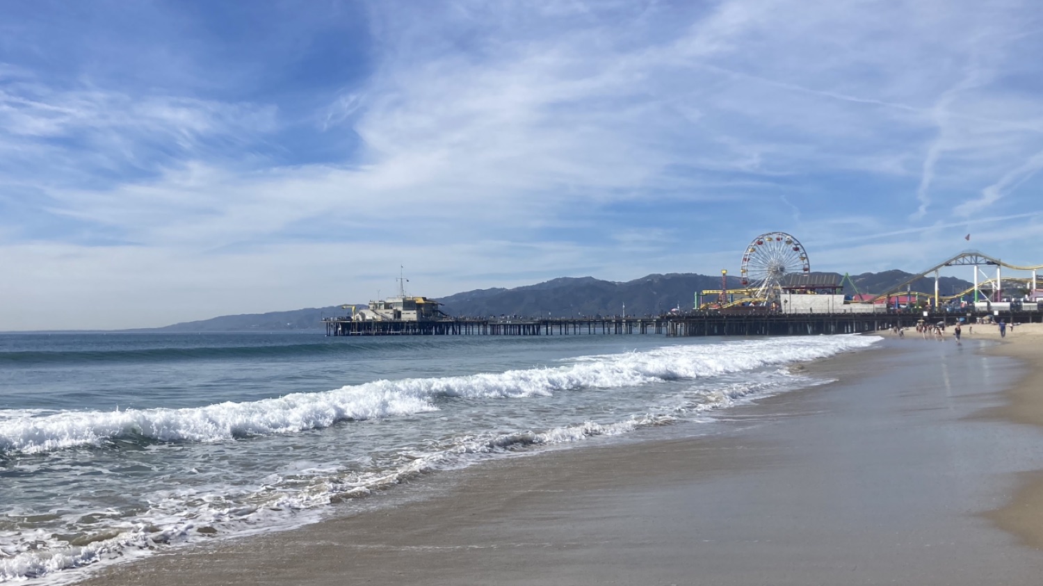 The Santa Monica Pier and shoreline on a clear day